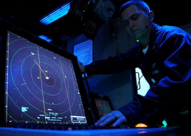 US Sailor looking at a radar screen